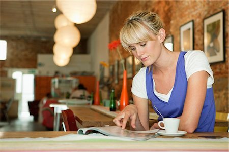 painting of people in a restaurant - Woman reading a magazine in a cafe Stock Photo - Premium Royalty-Free, Code: 6108-05864571