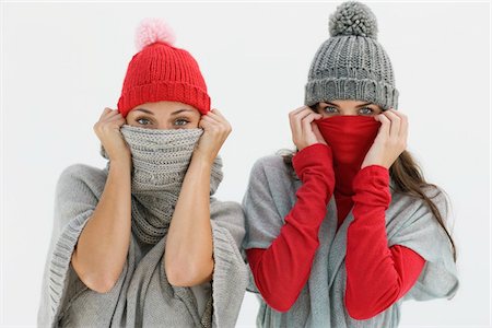 Portrait of two women hiding their faces Foto de stock - Sin royalties Premium, Código: 6108-05864885