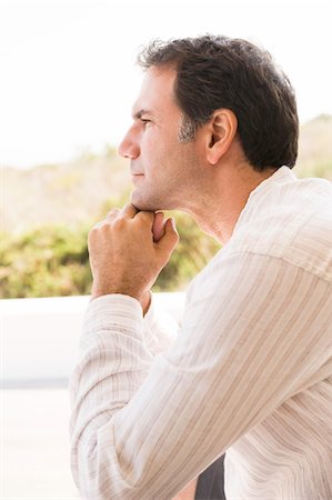 simsearch:6108-05860384,k - Close-up of a man thinking Foto de stock - Sin royalties Premium, Código: 6108-05865001