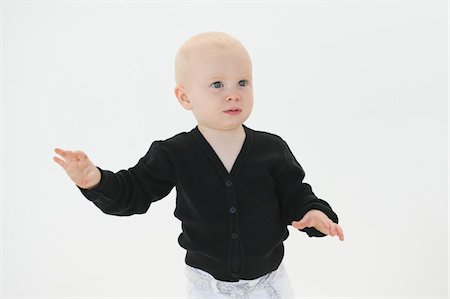 Close-up of a baby boy gesturing Stock Photo - Premium Royalty-Free, Code: 6108-05865650