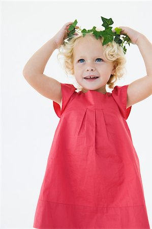 dance studio - Girl wearing a wreath and smiling Stock Photo - Premium Royalty-Free, Code: 6108-05865631