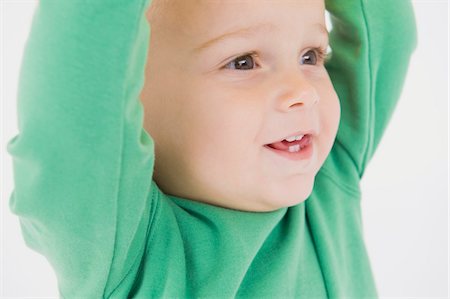 simsearch:6108-05863835,k - Close-up of a baby boy smiling Stock Photo - Premium Royalty-Free, Code: 6108-05865703