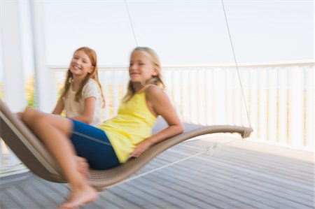 simsearch:6108-05860226,k - Two girls in a hammock Stock Photo - Premium Royalty-Free, Code: 6108-05865966