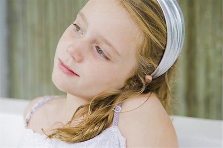 simsearch:6108-05863071,k - Close-up of a girl thinking Stock Photo - Premium Royalty-Free, Code: 6108-05865907