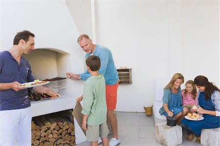 father barbecue - Family cooking food Stock Photo - Premium Royalty-Free, Code: 6108-05866326