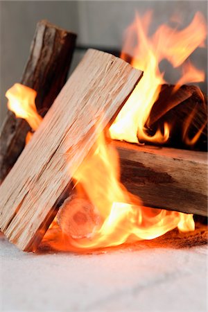 Close-up of firewood burning Stock Photo - Premium Royalty-Free, Code: 6108-05866454