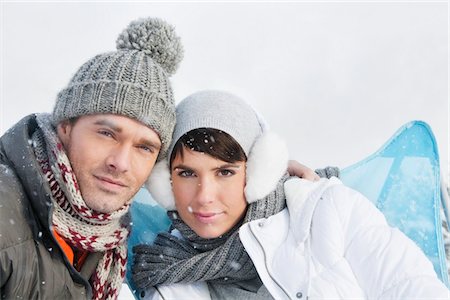 simsearch:6108-05866881,k - Young couple in winter clothes looking at camera Stock Photo - Premium Royalty-Free, Code: 6108-05866884