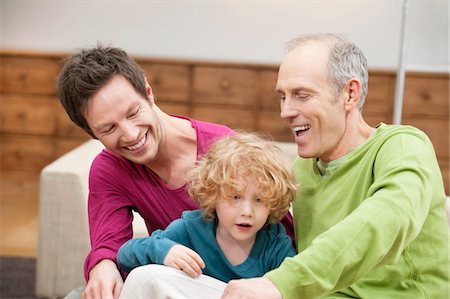 simsearch:6108-05867579,k - Family smiling together Stock Photo - Premium Royalty-Free, Code: 6108-05867533