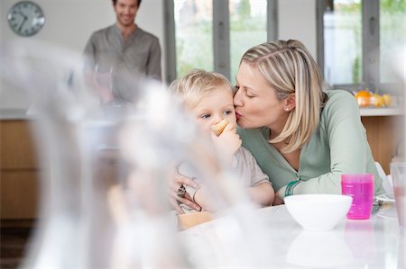 Woman kissing her son Stock Photo - Premium Royalty-Free, Code: 6108-05867624