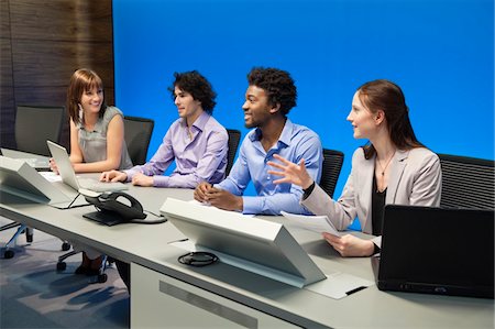 simsearch:6108-05868661,k - Business executives working in a control room Stock Photo - Premium Royalty-Free, Code: 6108-05868146