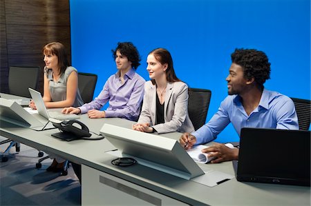 simsearch:6108-05868100,k - Business executives working in a control room Stock Photo - Premium Royalty-Free, Code: 6108-05868124