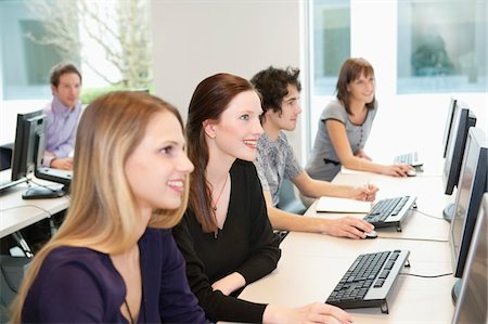 formal mouse computer - Business executives working on computers in a training class Foto de stock - Sin royalties Premium, Código: 6108-05868555