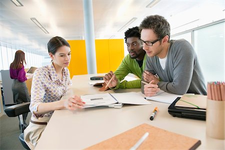 simsearch:6108-05868100,k - Business executives working in an office Stock Photo - Premium Royalty-Free, Code: 6108-05868504