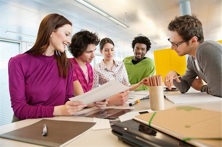 simsearch:6108-06167952,k - Business executives discussing in an office Stock Photo - Premium Royalty-Free, Code: 6108-05868512