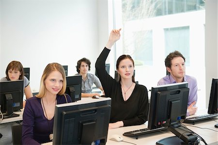 raising hand - Business executives in a training class Stock Photo - Premium Royalty-Free, Code: 6108-05868532