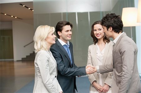 shaking - Business executives shaking hands Stock Photo - Premium Royalty-Free, Code: 6108-05868791