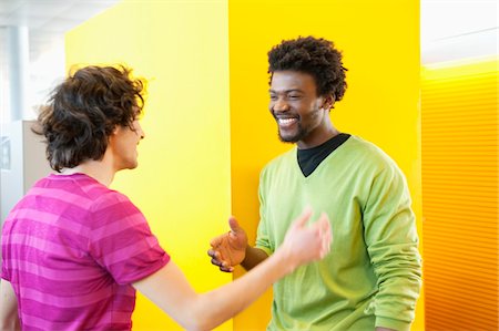 diversity workplace - Businessmen smiling in an office Stock Photo - Premium Royalty-Free, Code: 6108-05868726