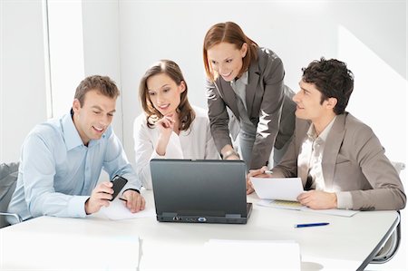 simsearch:6108-05868312,k - Business executives working in an office Stock Photo - Premium Royalty-Free, Code: 6108-05868856