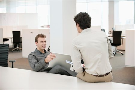 Two businessmen working in an office Stock Photo - Premium Royalty-Free, Code: 6108-05868868