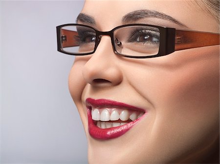 Young woman wearing eyeglasses Stock Photo - Premium Royalty-Free, Code: 6108-05869019