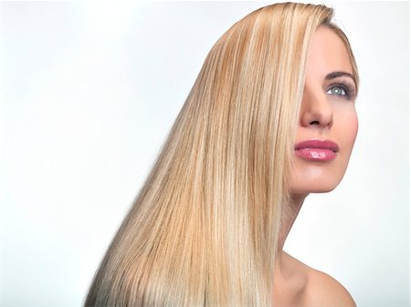 simsearch:6108-05869222,k - Portrait of young blond woman Foto de stock - Royalty Free Premium, Número: 6108-05869285