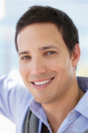 Portrait of a mid adult man smiling Stock Photo - Premium Royalty-Free, Code: 6108-05869610