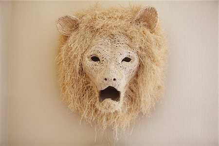 Close-up of a lion head decorated on a wall Stock Photo - Premium Royalty-Free, Code: 6108-05869753