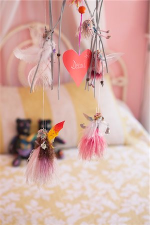 Close-up of wind chime decorated in a bedroom Foto de stock - Sin royalties Premium, Código: 6108-05869773