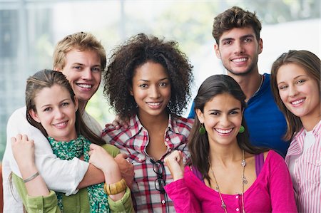 Portrait of multi-ethnic university students standing together Stock Photo - Premium Royalty-Free, Code: 6108-05869873