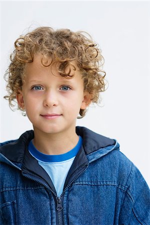 portrait of a blond boy - Portrait of a boy Stock Photo - Premium Royalty-Free, Code: 6108-05870609