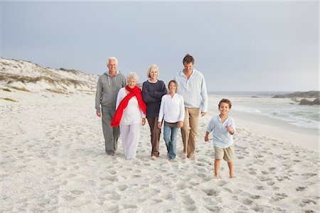 Family enjoying on the beach Stock Photo - Premium Royalty-Free, Code: 6108-05870841