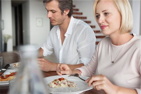 pizza couple - Couple having food Stock Photo - Premium Royalty-Free, Code: 6108-05871238