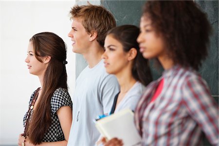 simsearch:6108-05871320,k - Close-up of university students standing together Stock Photo - Premium Royalty-Free, Code: 6108-05871354