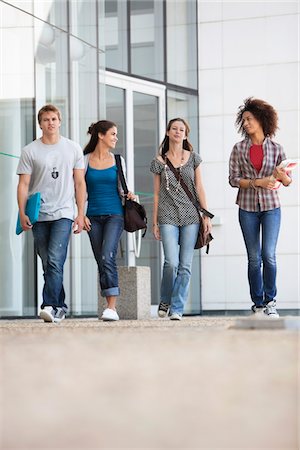 simsearch:6108-05871320,k - University students walking in a campus Stock Photo - Premium Royalty-Free, Code: 6108-05871315