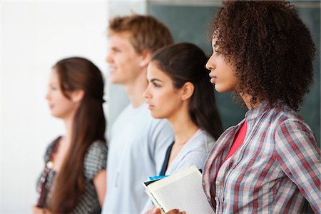 simsearch:6108-05871320,k - Close-up of university students standing together Stock Photo - Premium Royalty-Free, Code: 6108-05871321