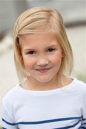 simsearch:6108-05871584,k - Portrait of a smiling girl Stock Photo - Premium Royalty-Free, Code: 6108-05871588