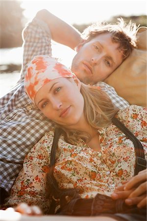 Young couple resting in the boat Stock Photo - Premium Royalty-Free, Code: 6108-05871848