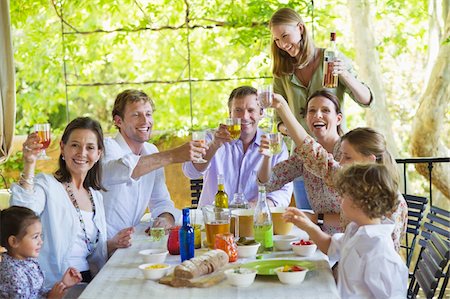 friends women indoors happy middle aged - Multi generation family eating food at house Stock Photo - Premium Royalty-Free, Code: 6108-05871948