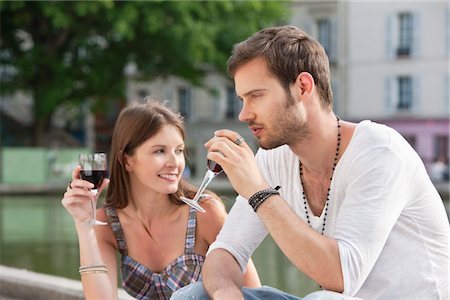 Couple drinking red wine, Paris, Ile-de-France, France Stock Photo - Premium Royalty-Free, Code: 6108-05873125