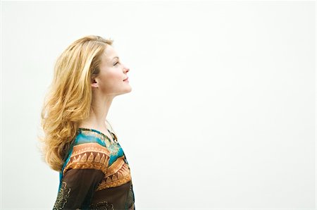 Portrait of a young womanin profile Stock Photo - Premium Royalty-Free, Code: 6108-05873482