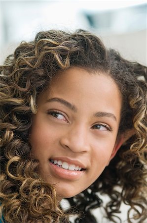 simsearch:6108-05863071,k - Close-up of a girl smiling Stock Photo - Premium Royalty-Free, Code: 6108-05873673