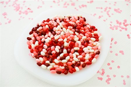 Close-up of colorful jellybeans in a bowl Stock Photo - Premium Royalty-Free, Code: 6108-05874066