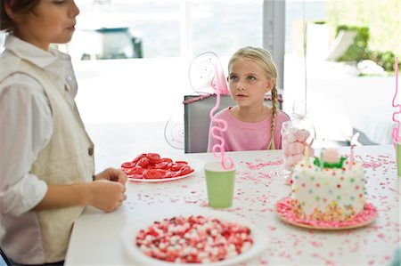 Two children in a birthday party Stock Photo - Premium Royalty-Free, Code: 6108-05874074