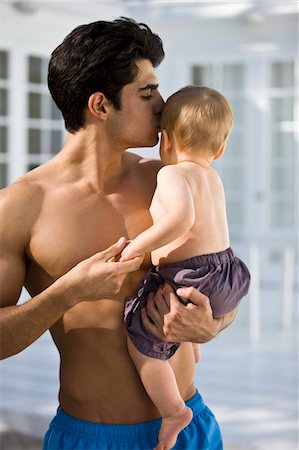 Man kissing his son Stock Photo - Premium Royalty-Free, Code: 6108-05874036