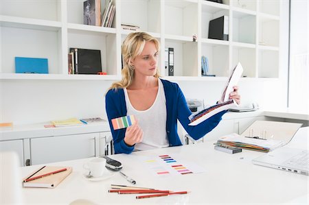 projecting - Businesswoman choosing color swatches Stock Photo - Premium Royalty-Free, Code: 6108-05874178