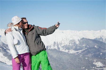 simsearch:6108-05866881,k - Young couple in ski wear taking self portrait Stock Photo - Premium Royalty-Free, Code: 6108-05874591