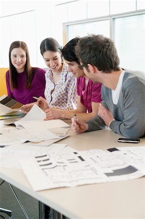 simsearch:6108-05868100,k - Business executives discussing in an office Stock Photo - Premium Royalty-Free, Code: 6108-05874720