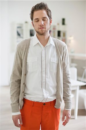 standing - Man standing with eyes closed Stock Photo - Premium Royalty-Free, Code: 6108-06165956
