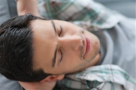 Close-up of a man resting Stock Photo - Premium Royalty-Free, Code: 6108-06166015
