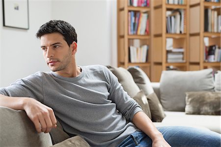 restos - Man resting on a couch Stock Photo - Premium Royalty-Free, Code: 6108-06166278